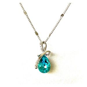 Silver necklace with teal teardrop pendant